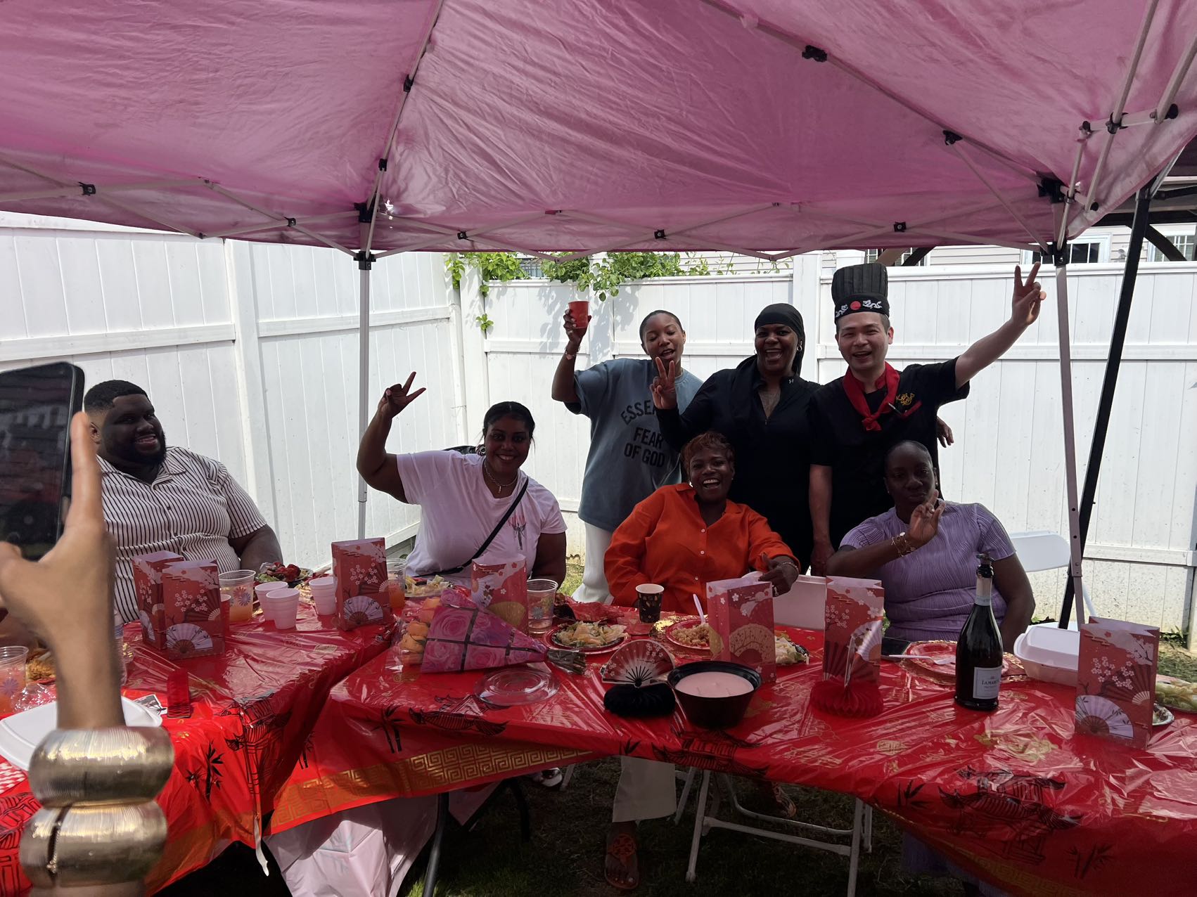 Family group celebrating with private hibachi chef